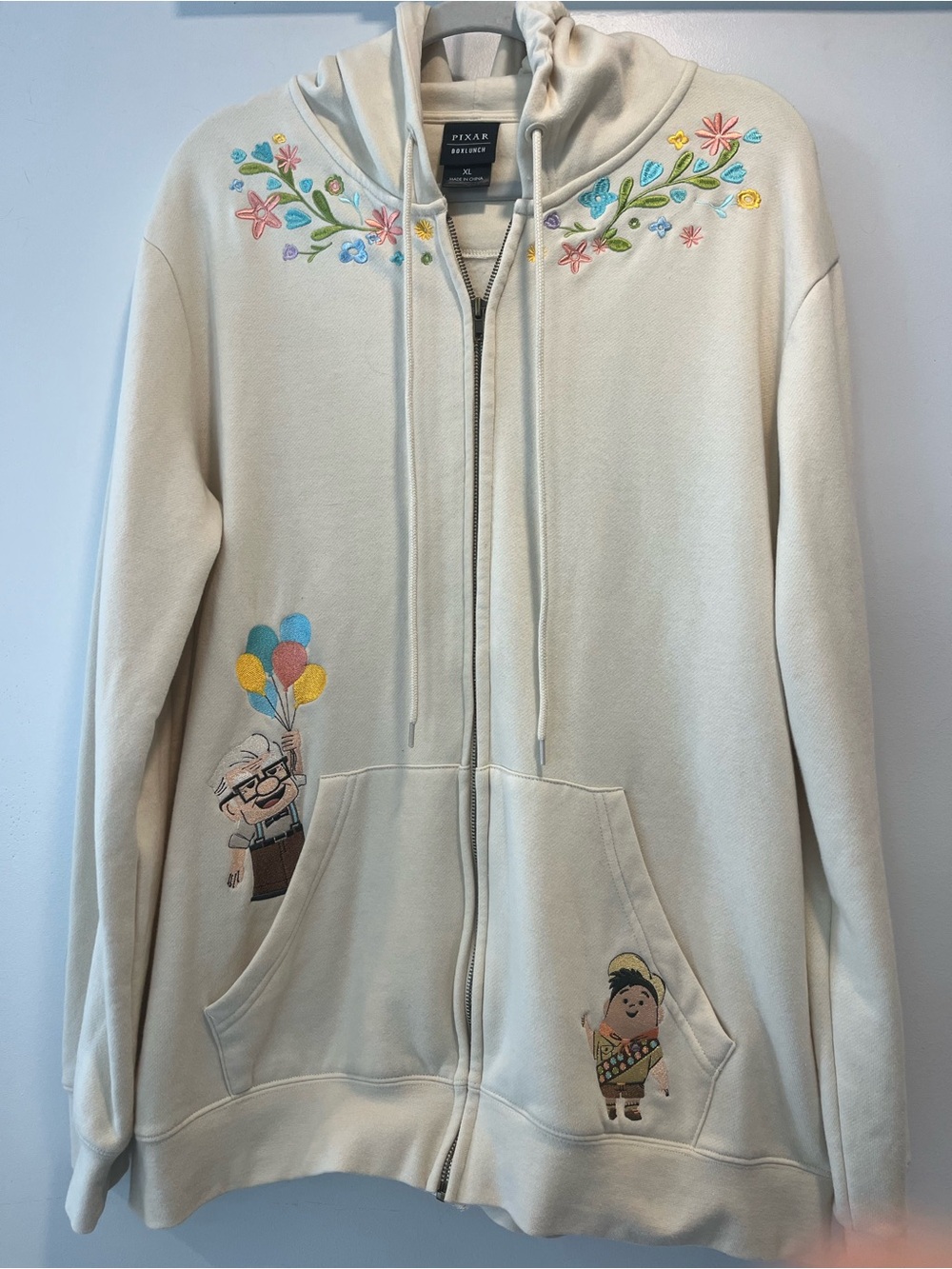 Pixar Disney’s lunchbox/ UP collectible cream, colored hoodie unisex size XL